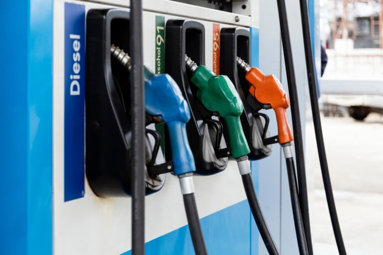 Fuel,Pump,Nozzles,In,Blue,,Green,And,Orange,For,Diesel,